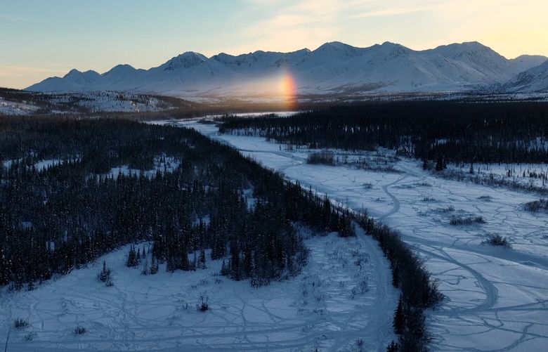 The sun rises over Denali Borough, Alaska, in early February. MUST CREDIT: Whitney Leaming/The Washington Post