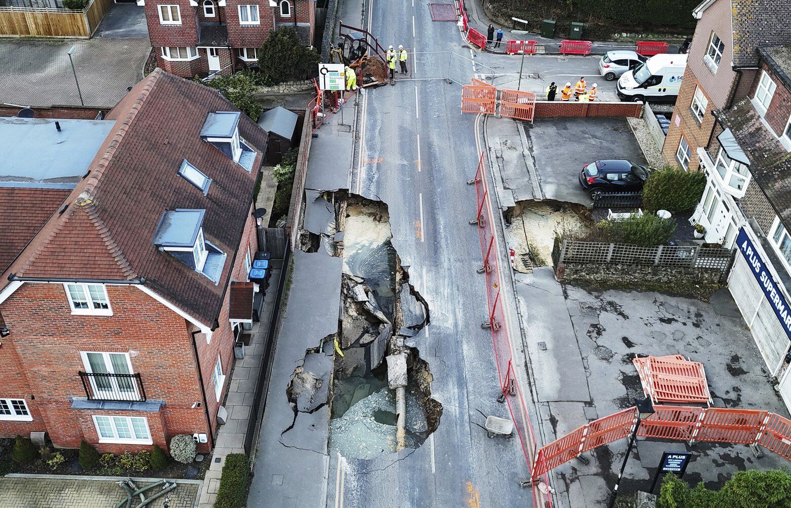Sinkhole opens up on the main street of an English village | The Sinkhole opens up on the main street of an English village | The