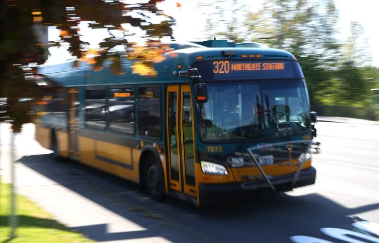 King County Metro bus, Route 320, heads up Bothel Way in Kenmore, on Wednesday, May 10, 2023.