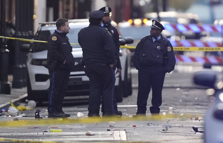 Emergency services attend to the scene on Bourbon Street after a vehicle drove into a crowd on New Orleans’ Canal and Bourbon Street on Wednesday, Jan. 1, 2025.