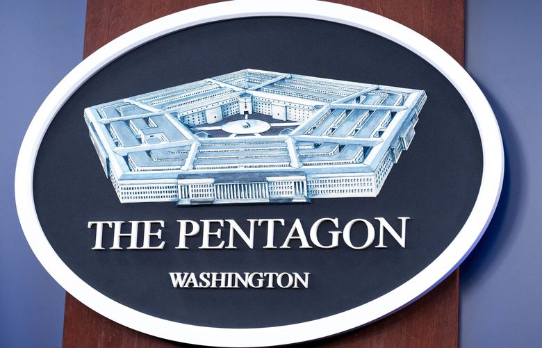 FILE – The Department of Defense logo is seen on the wall in the Press Briefing room at the Pentagon, Oct. 29, 2024, in Washington. (AP Photo/Kevin Wolf, File) NYSS501 NYSS501