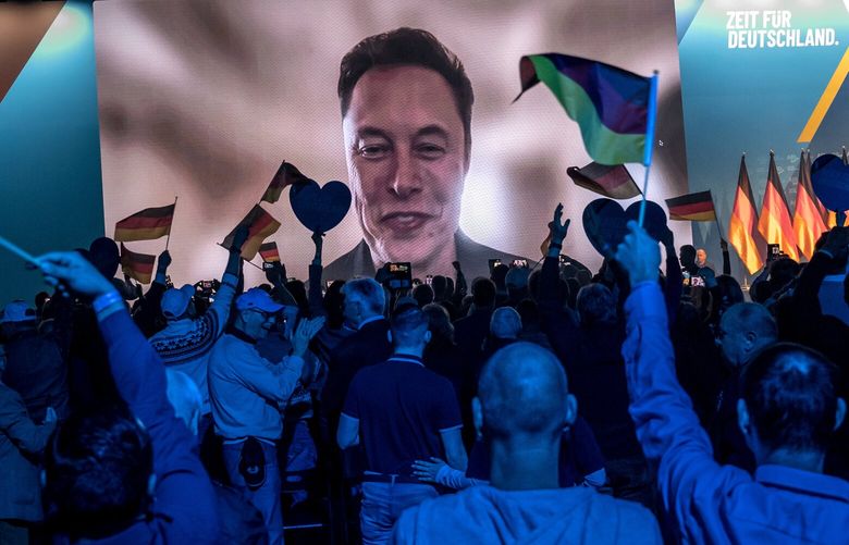 FILE – Elon Musk addresses an election campaign rally for the far-right Alternative for Germany party in Halle, Germany, Jan. 26, 2025. Musk’s political activities and reduced presence at Tesla are stirring dissatisfaction within the company, and he has not outlined a plan to reverse falling sales. (Sergey Ponomarev/The New York Times)