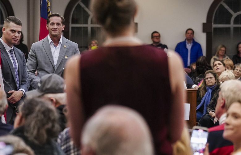 Rep. Richard McCormick (R-Georgia) listens to a question from an attendee during a Thursday town hall meeting in Roswell, Georgia. MUST CREDIT: Elijah Nouvelage/For The Washington Post