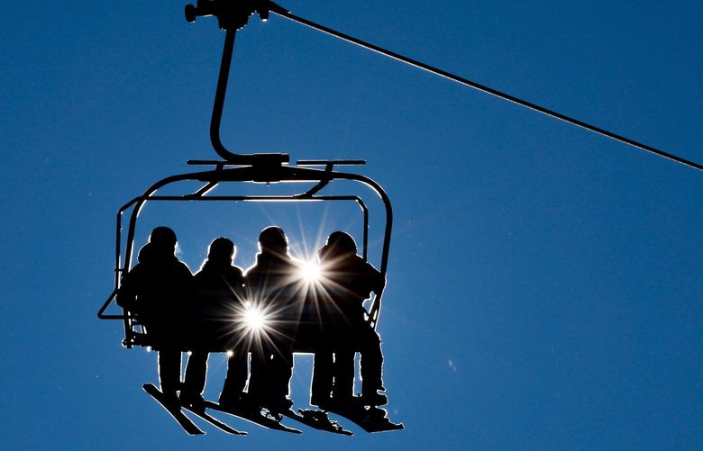 Skiers and snowboarders ride up Hogsback on Saturday, Jan. 18, 2025 at Stevens Pass Ski Resort.  