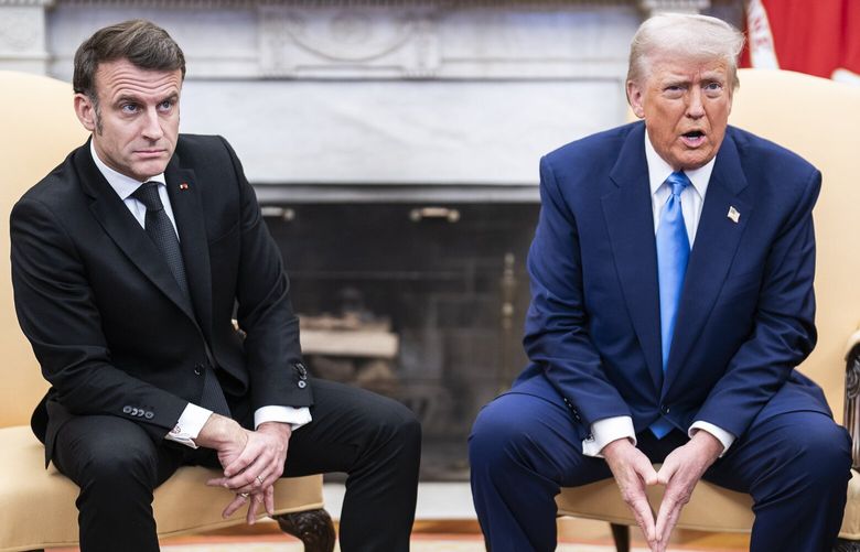 French President Emmanuel Macron meets with President Donald Trump in the Oval Office at the White House on Feb. 24. (MUST CREDIT: Jabin Botsford/The Washington Post)