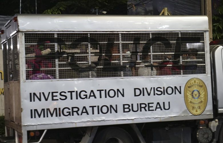 This photo provided by Thailand’s daily web newspaper Prachatai shows a vehicle with a load of unidentified passengers leave the detention center in Bangkok, Thailand Thursday, Feb. 27, 2025.(Nuttaphol Meksobhon/Prachatai via AP) TOK801 TOK801