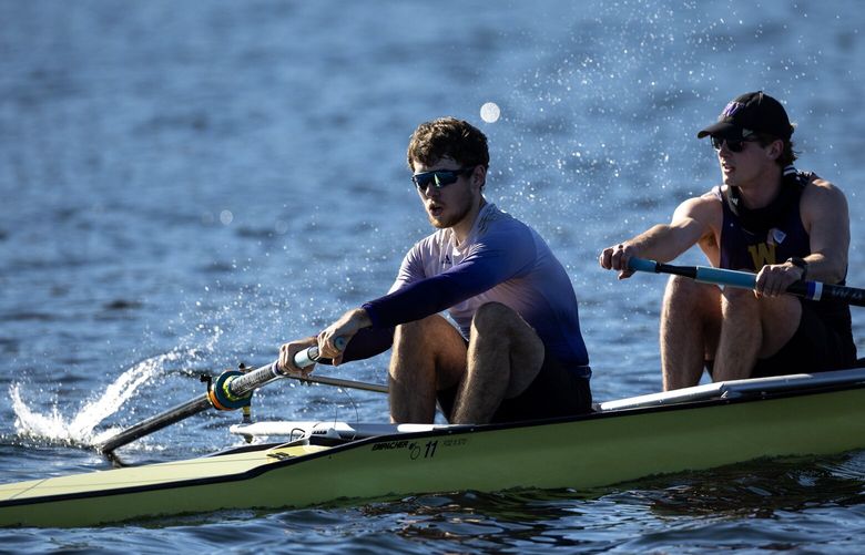 Members of the UW rowing team train on Lake Union on Thursday, Feb. 27, 2025, in Seattle.