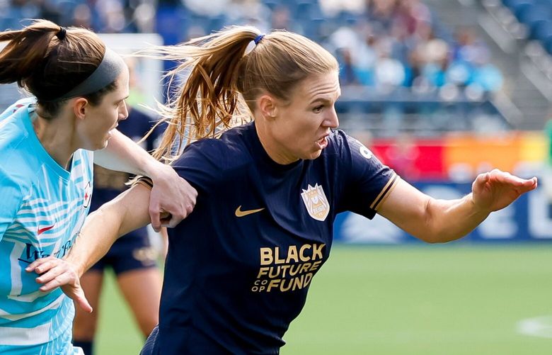 Chicago Red Stars midfielder Taylor Malham fouls Seattle Reign FC forward Veronica Latsko during the first half Sunday, April 21, 2024 in Seattle. 226691