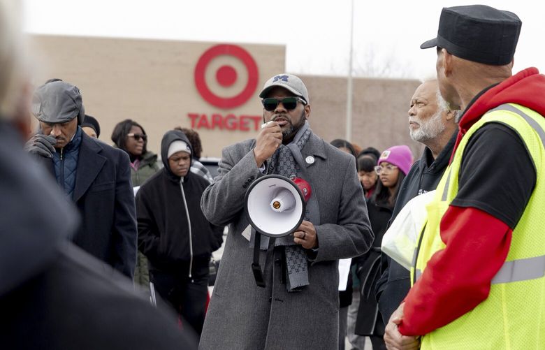 The Rev. Charles Williams II speaks to a crowd of pastors and parishioners from Black churches in the Detroit area on Feb. 23, during a “good-buy” Sunday at a Target in Southfield, Michigan. MUST CREDIT: Sylvia Jarrus/For The Washington Post