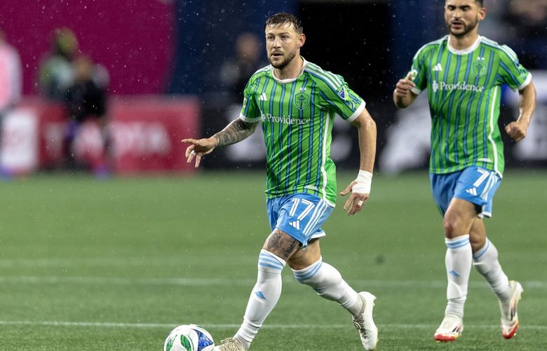 Seattle Sounders forward Paul Arriola (17) dribbles the ball upfield during the second half of an MLS soccer match against Charlotte FC on Saturday, Feb. 22, 2025, in Seattle.