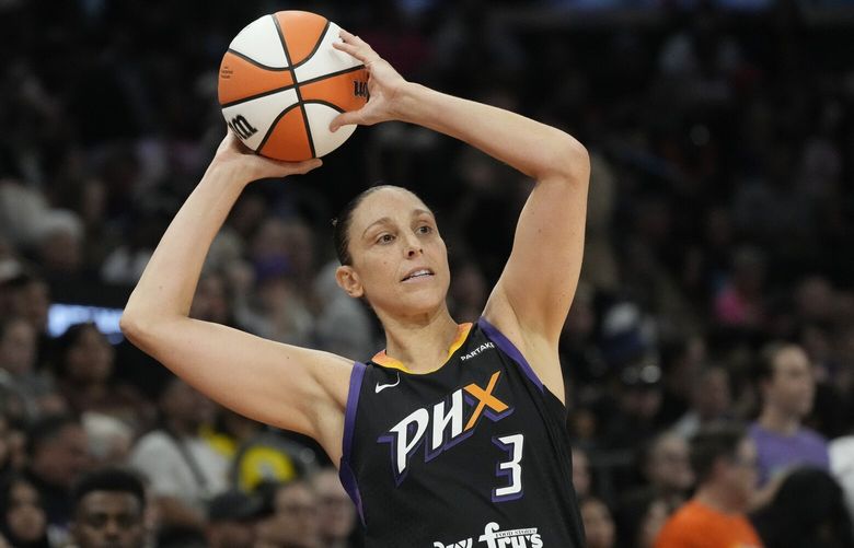 FILE – Phoenix Mercury guard Diana Taurasi looks to pass the ball against the Seattle Storm during the first half of a WNBA basketball game, Sept. 19, 2024, in Phoenix. (AP Photo/Ross D. Franklin, File) RFOTK204 RFOTK204