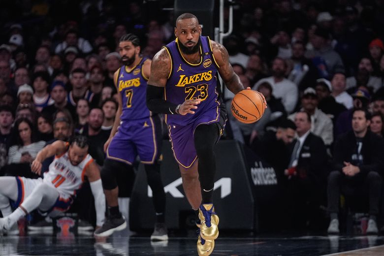 A 2,500th 3-pointer, a triple-double, Bronny's basket give LeBron James another memorable MSG game | The Seattle Times