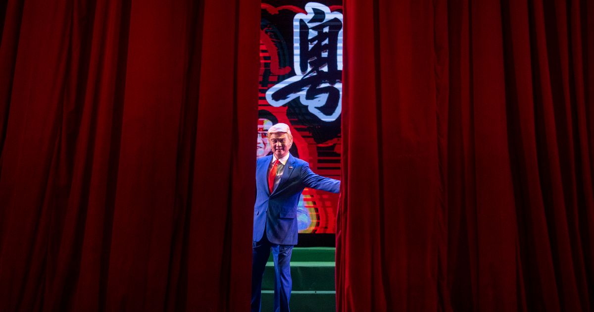 AP PHOTOS: In a modern twist to Cantonese opera, Trump sings in Chinese and wins cheers in Hong Kong