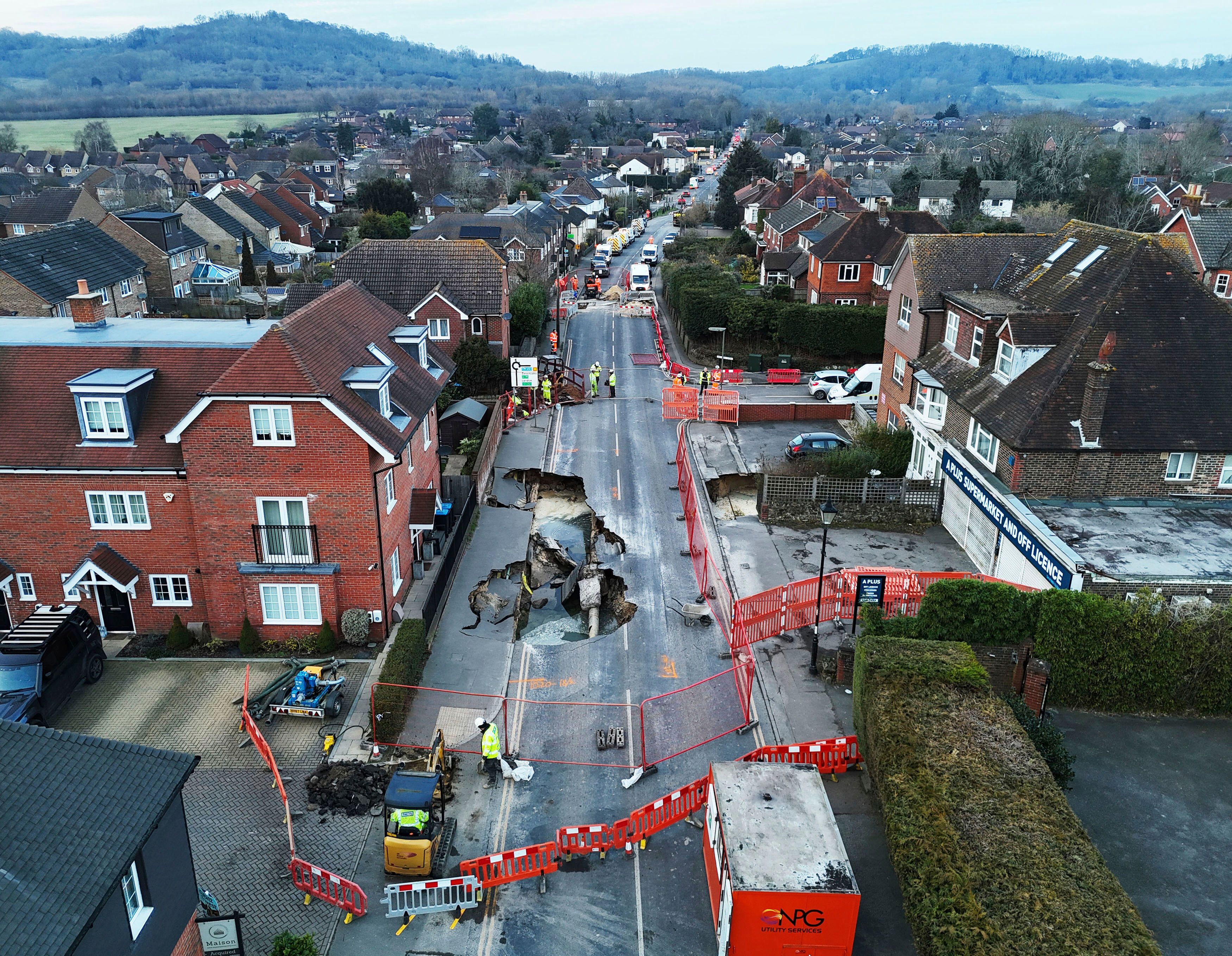 Sinkhole opens up on the main street of an English village | The