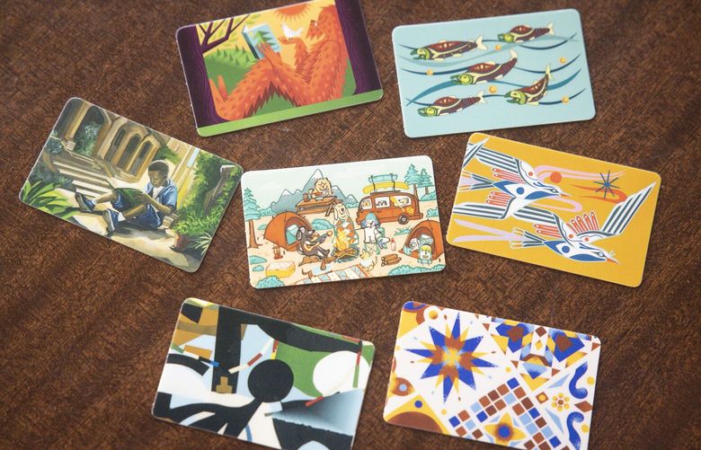 King County Library System’s new cards designed by local artists seen on display at Bellevue Library in Bellevue on Friday, Feb. 28, 2025. 

 229450