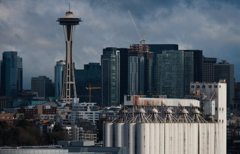 Sunlight shines on the Terminal 86  Grain Facility in Seattle Tuesday, March 4, 2024.   229495