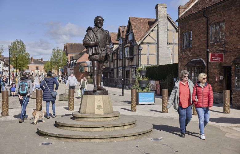 A statue of Shakespeare in his birthplace, Stratford-upon-Avon, England, March 4, 2025. An Oxford researcher found a rare, handwritten variation of one of Shakespeare’s most famous love poems. (Andy Haslam/The New York Times) XNYT0960 XNYT0960