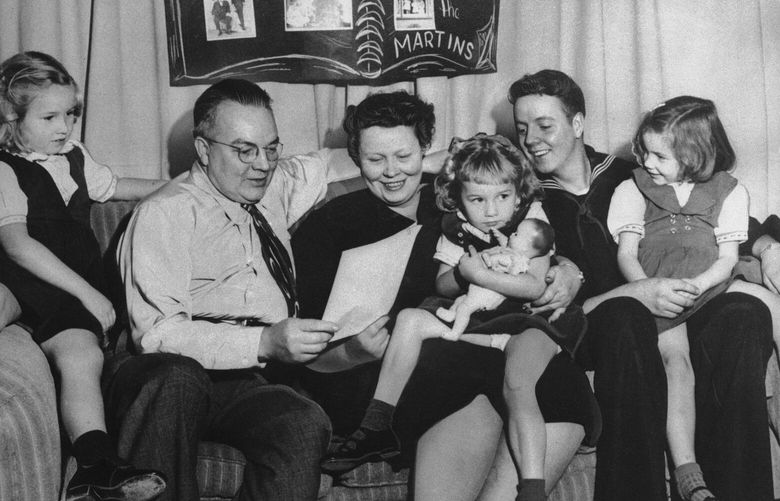 FILE – The Christmas photo of the Ken Martin family, from left, Barbara, 7; Ken, Barbara, Sue, 4; Donald, 21; and Virginia, 6; in Portland, Ore., in December 1952. (Ken Martin family via AP, File) NYSS401 NYSS401