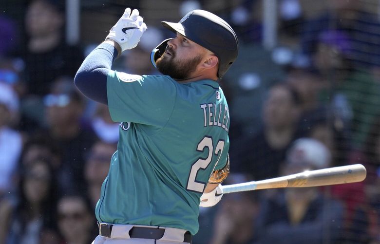 Seattle Mariners’ Rowdy Tellez follows through with his swing against the Colorado Rockies during the third inning of a spring training baseball game Sunday, March 2, 2025, in Scottsdale, Ariz. (AP Photo/Ross D. Franklin) RFOTK216 RFOTK216