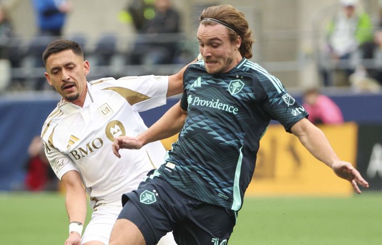 Seattle Sounders forward Pedro De La Vega (10) battles for control of the ball during the first half of a match against Los Angeles FC at Lumen Field in Seattle on Saturday, March 8, 2025.    229492