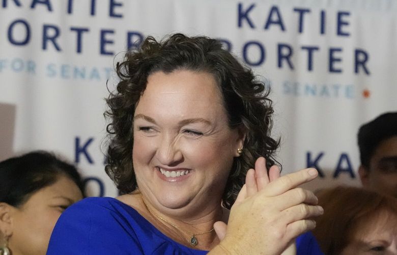 FILE – U.S. Rep. Katie Porter, D-Calif., smiles as she prepares to address supporters at an election night party, Tuesday, March 5, 2024, in Long Beach, Calif. (AP Photo/Damian Dovarganes, File) LA103 LA103