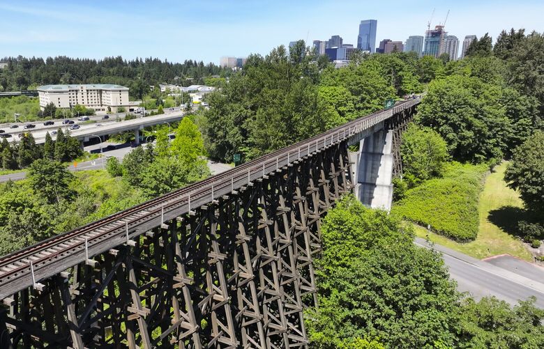 The Wilburton Trestle in Bellevue on Friday, May 31, 2024. The 1,000-foot-long trail bridge will be a part of Eastrail, offering skyline views of downtown Bellevue and connections to other regional trails and Sound Transit Link light rail. The 120-year-old trestle – the oldest of its kind in the Pacific Northwest – is expected to be one of the most popular segments of the emerging 42-mile Eastrail, a former railroad line that is being converted into an uninterrupted regional trail that connects South and East King County communities to Snohomish County with a spur to Redmond.” 227088