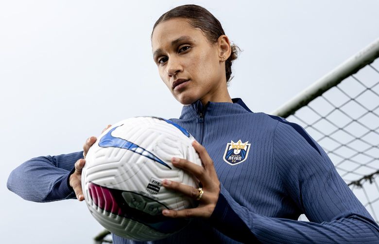 Seattle Reign forward Lynn Biyendolo poses for a portrait on Tuesday, March 11, 2025, in Tukwila.