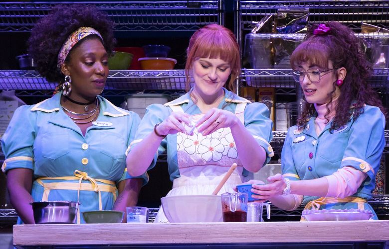 Friends and diner co-workers Dawn, Jenna and Becky (played by Tori Gresham, Kerstin Anderson, and Porscha Shaw, respectively) have each other’s backs in the Sara Bareilles musical ‘Waitress,’ running at The 5th Avenue Theatre through March 30.