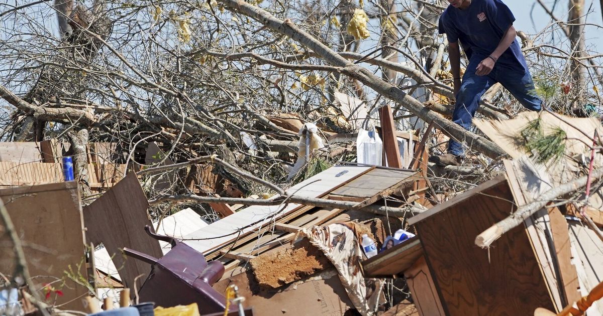 Residents pick up the pieces after devastating storms scour the US ...