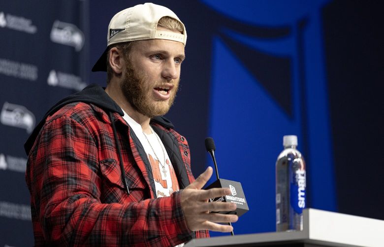 Newly-signed Seahawks wide receiver Cooper Kupp speaks during a press conference on Tuesday, March 18, 2025, in Renton.