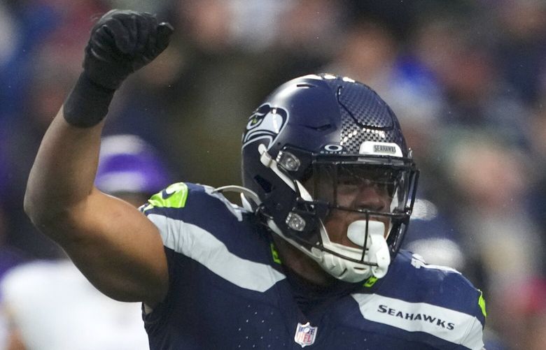 Seattle Seahawks linebacker Uchenna Nwosu reacts during an NFL football game against the Minnesota Vikings, Sunday, Dec. 22, 2024, in Seattle. (AP Photo/Lindsey Wasson)