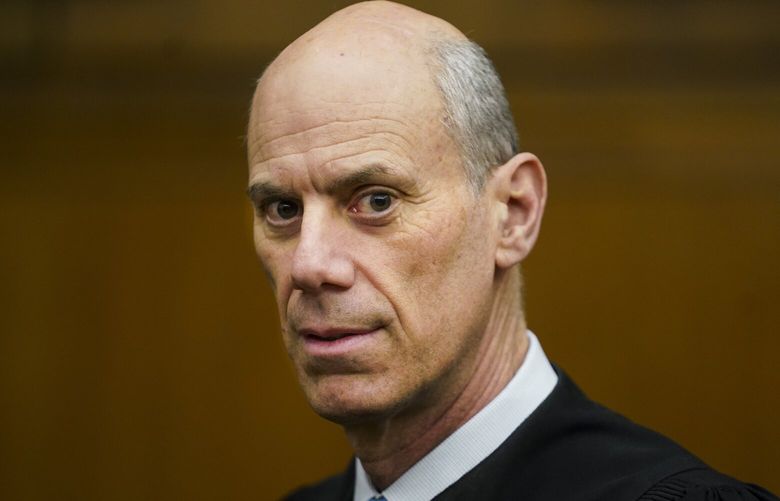 FILE – U.S. District Judge James Boasberg, chief judge of the United States District Court for the District of Columbia, stands for a portrait at E. Barrett Prettyman Federal Courthouse in Washington, March 16, 2023. (Carolyn Van Houten/The Washington Post via AP, File) DCWAP201 DCWAP201