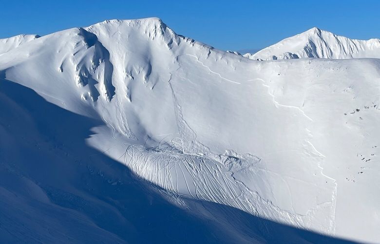 This Sunday, March 23, 2025, image released by the Chugach National Forest Avalanche Center shows the aftermath of a slab avalanche that killed a snow machine rider on Saturday, March 22, in Turnagain Pass, Alaska. (Chugach National Forest Avalanche Center via AP) AKHO101 AKHO101