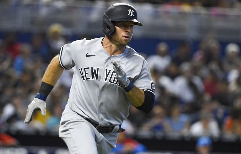Brett Gardner (11) of the New York Yankees runs toward first base after a base hit in the eighth inning against the Miami Marlins at loanDepot park on Aug. 1, 2021, in Miami. (Eric Espada/Getty Images/TNS) 138251248W 138251248W