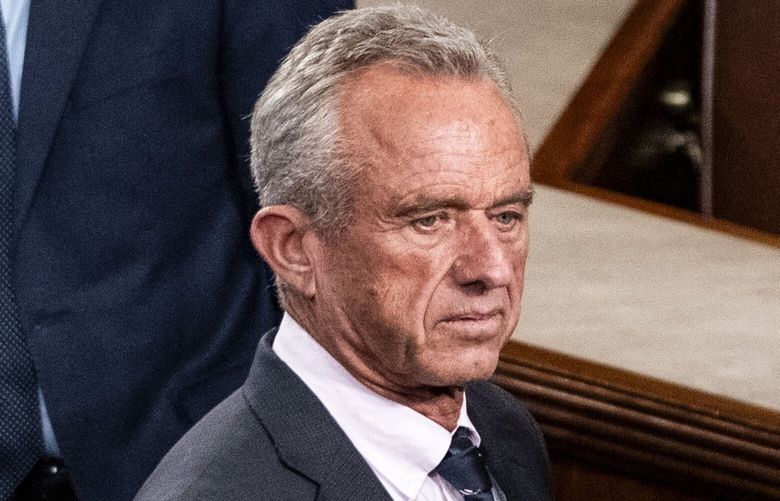 FILE — Robert F. Kennedy Jr., Secretary of Health and Human Services, and Howard Lutnick, Secretary of Commerce, arrive before President Donald Trump gives an address to a joint session of Congress in Washington, March 4, 2025. President Donald Trump’s first four years in the White House were filled with falsehoods and  now he and those around him are using false claims to justify their policy changes. (Haiyun Jiang/The New York Times) XNYT0655 XNYT0655