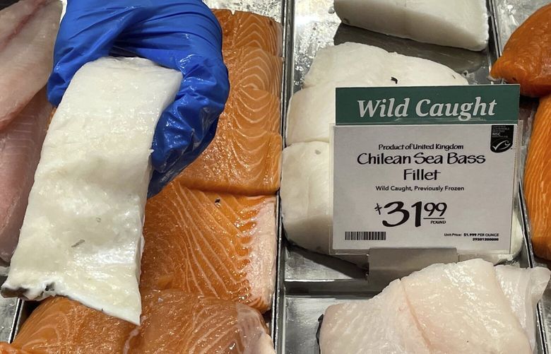 FILE – Fillets of Chilean sea bass caught near the U.K.-controlled South Georgia island are displayed for sale at a Whole Foods Market in Cleveland, Ohio on June 17, 2022. (AP Photo/Joshua Goodman, file) llt105 llt105