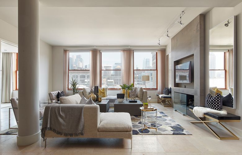 Modular sofa sections are placed opposite each other to create a cohesive look. (Scott Gabriel Morris/TNS)