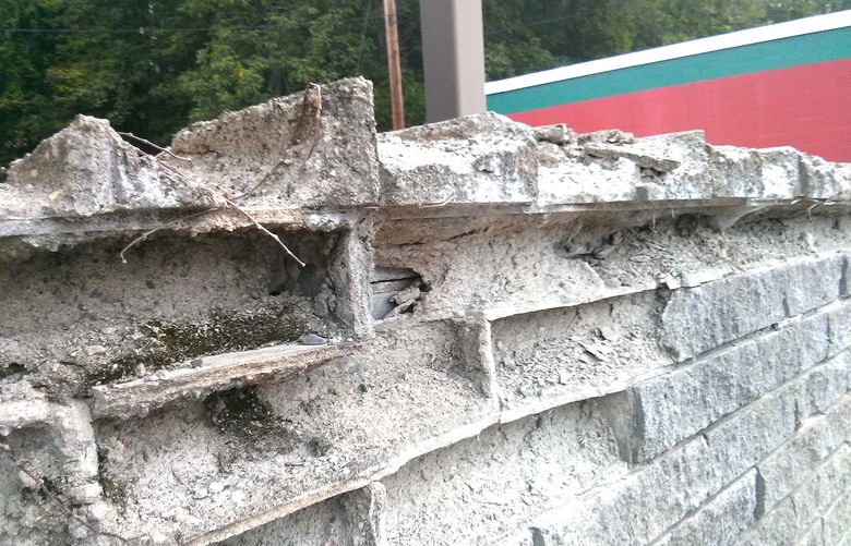 What used to be solid concrete blocks have eroded into sand and small rocks. The blocks failed because of a manufacturing defect. The mortar used to lay them didn’t fail. (Tim Carter/Tribune Content Agency)