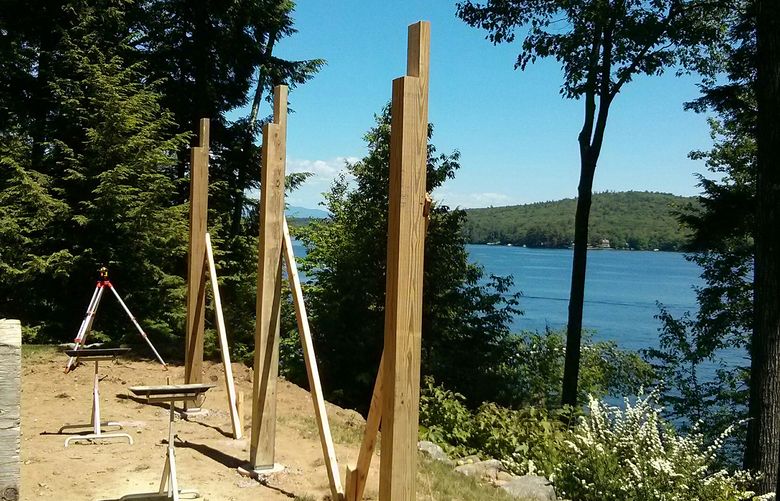 According to the author, these 6-by-6 treated lumber posts need a few more braces before the long double 2-by-12 beam is set in the L-shaped notches. (Tim Carter/Tribune Content Agency)