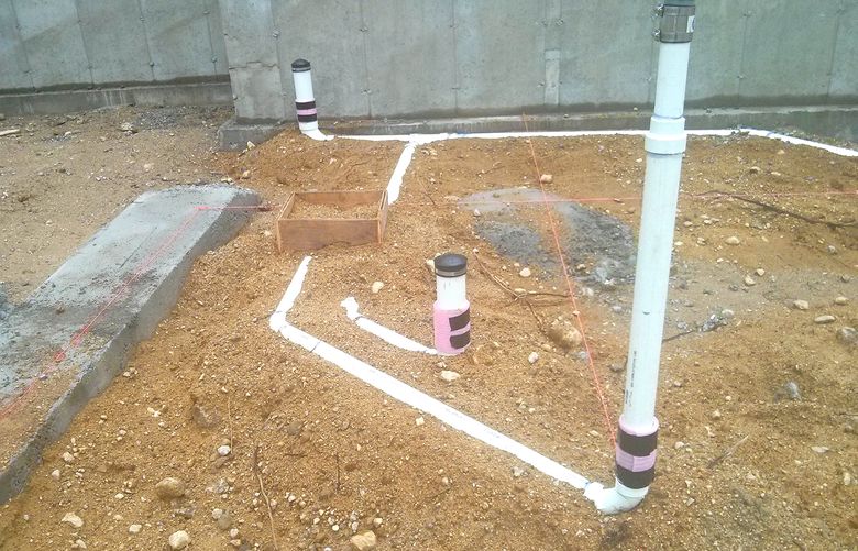 Installing plumbing drain pipes like this that go beneath a slab can happen in a few days in most situations. (Tim Carter/Tribune Content Agency)