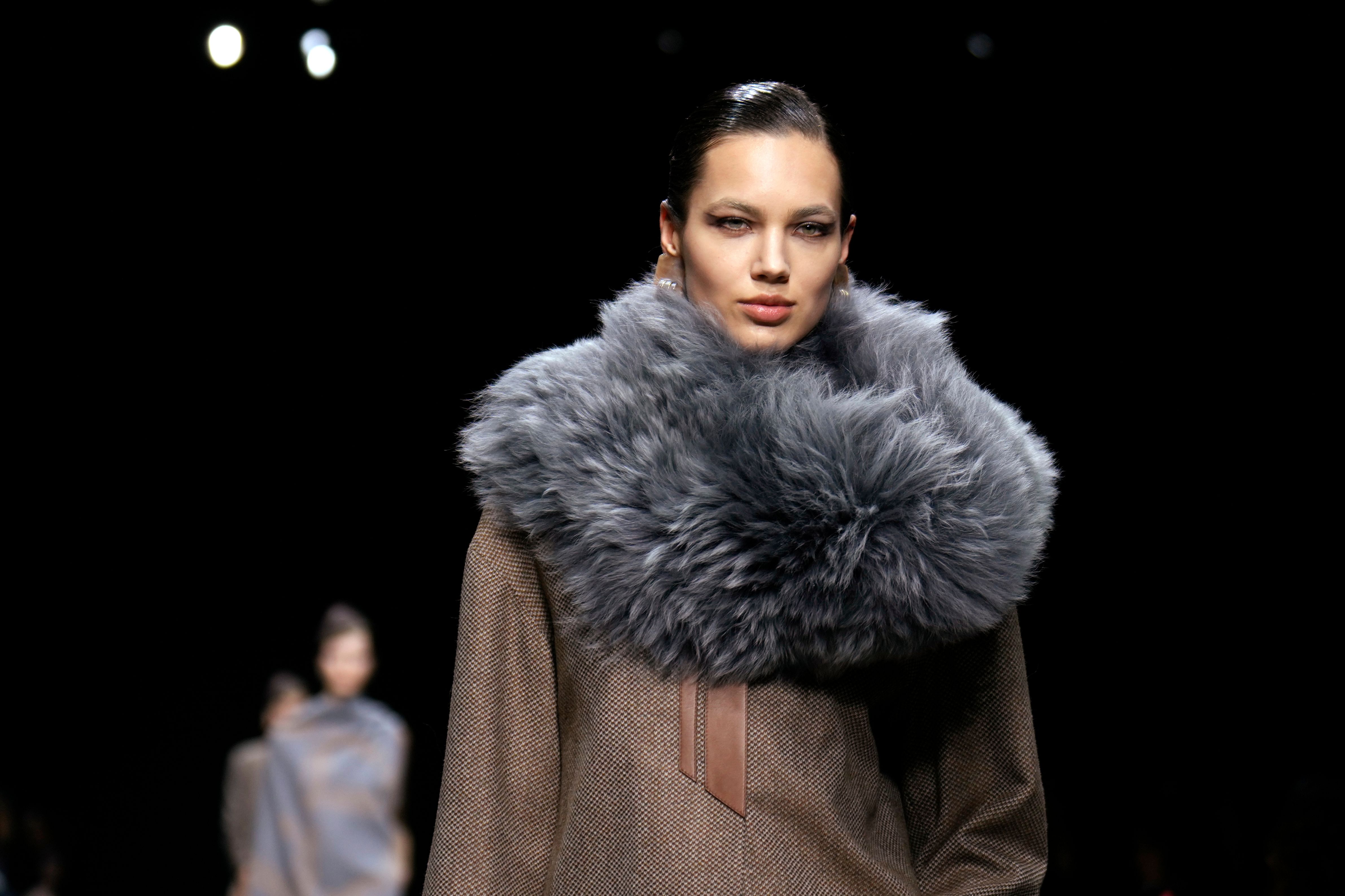 Giorgio Armani's latest collection plumbs roots of 50-year-old