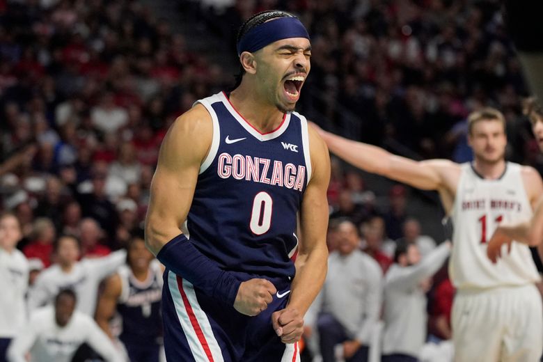 Gonzaga guard Ryan Nembhard (0) celebrates after a play against Saint Mary’s during the first half of an NCAA college basketball championship game in the West Coast Conference men’s tournament Tuesday, March 11, 2025, in Las Vegas. (AP Photo/John Locher)