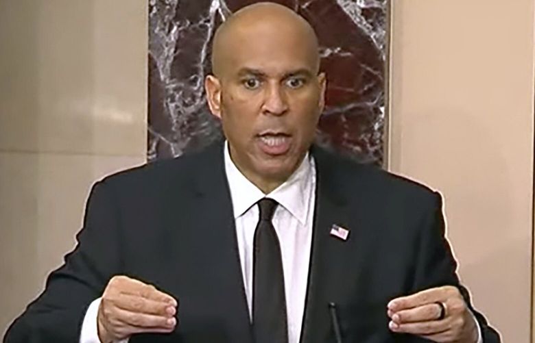 In this image provided by Senate Television, Sen, Cory Booker, D-N.J. speaks on the Senate floor, Tuesday morning, April 1, 2025. (Senate Television via AP) WX104 WX104