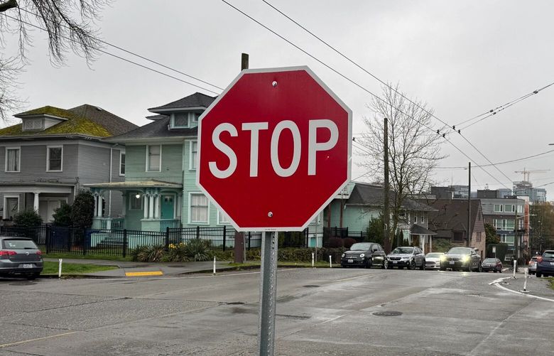 One of two unauthorized stop signs that were installed at the intersection of E John Street and 14th Avenue E. Dante Morelli noticed they weren’t reflective and didn’t look up to city standards.