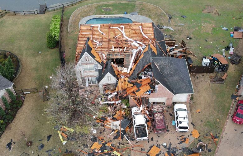 Severe storm damage is shown off 96th Street North between Garnett Road and Mingo Road Wednesday, April 2, 2025, in Owasso, Okla. (Mike Simons/Tulsa World via AP) OKTUL402 OKTUL402