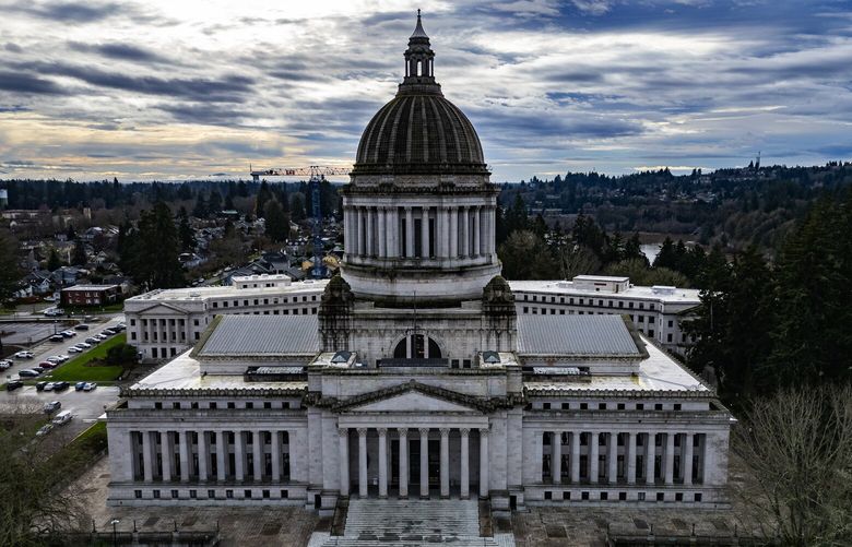 The Washington State Capitol Building is seen from the air, Thursday, Dec. 19, 2024 in Olympia.