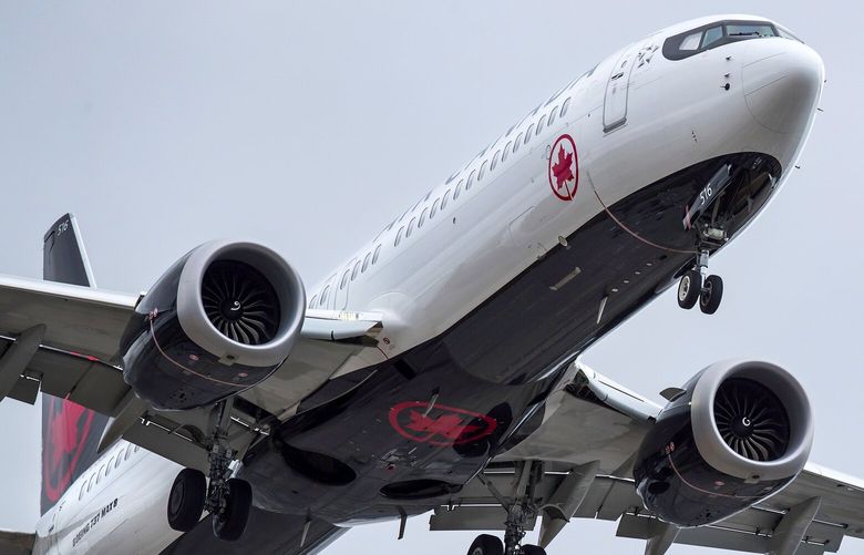 An Air Canada Boeing 737 Max 8 aircraft arriving from Toronto prepares to land at Vancouver International Airport, in Richmond, British Columbia on Tuesday, March 12, 2019. Canadian Transport Minister Marc Garneau says “all options are on the table” with regard to the country’s fleet of Boeing 737 Max 8 aircraft but says the government currently has no plans to order the grounding of the plane. (Darryl Dyck/The Canadian Press via AP) VCRD101 VCRD101 VCRD101