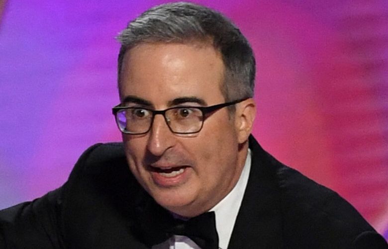 John Oliver accepts the Outstanding Scripted Variety Series award for “Last Week Tonight with John Oliver” onstage during the 76th Emmy Awards at the Peacock Theatre at L.A. Live in Los Angeles on Sept. 15, 2024. (Valerie Macon/AFP/Getty Images/TNS) 138944963W 138944963W