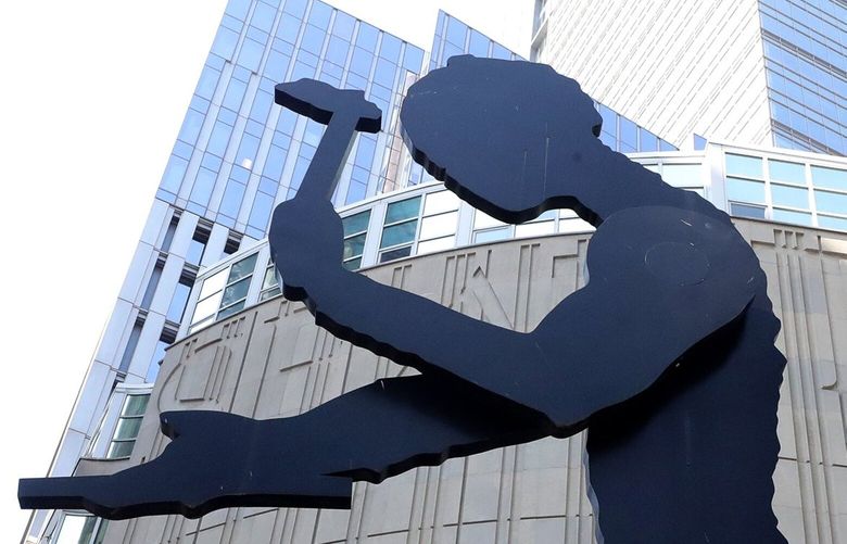 Artist Jonathan Borofskyâ€™s â€œThe Hammering Manâ€ sculpture in Seattle was installed in 1982, and is 48-ft tall,, and weighs 26,000 pounds. It is located directly in front of the Seattle Art Museum 224352