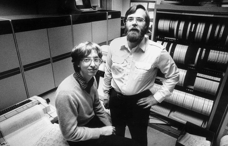 In 1981, computers the size of refrigerators and cabinets of tapes for reel-to-reel computer tape drives lined the walls in the small offices of Microsoft founders Bill Gates, left, and Paul Allen in Bellevue, Wash. In 1981 Microsoft employed 85 people. Since then Microsoft has moved to neighboring Redmond, Wash., and now employs 27,000 people. (AP Photo/Journal-American, Jim Hallas) MANDATORY CREDIT